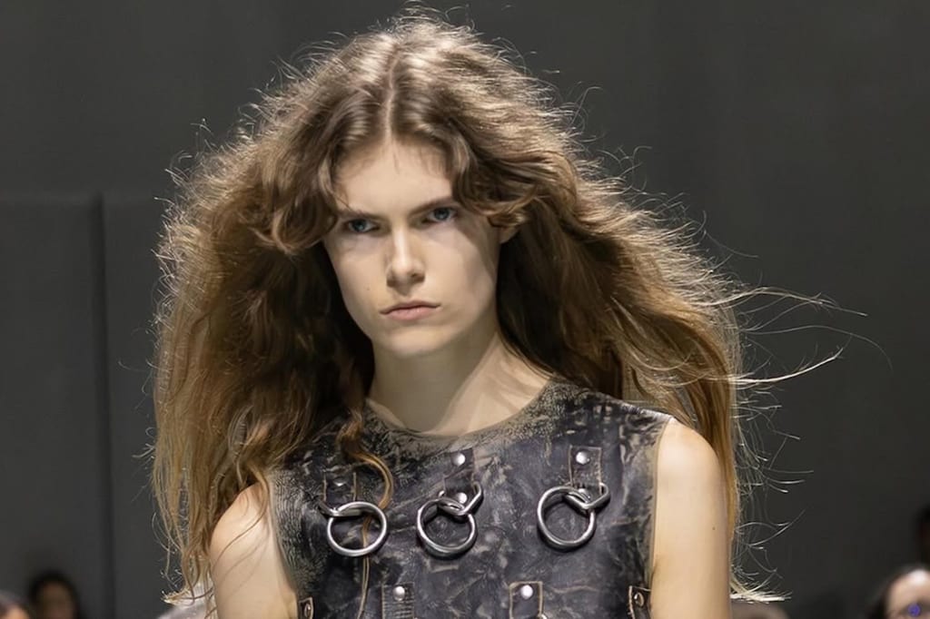 Why do Miuccia Prada’s models look like they’ve never seen a hairbrush?